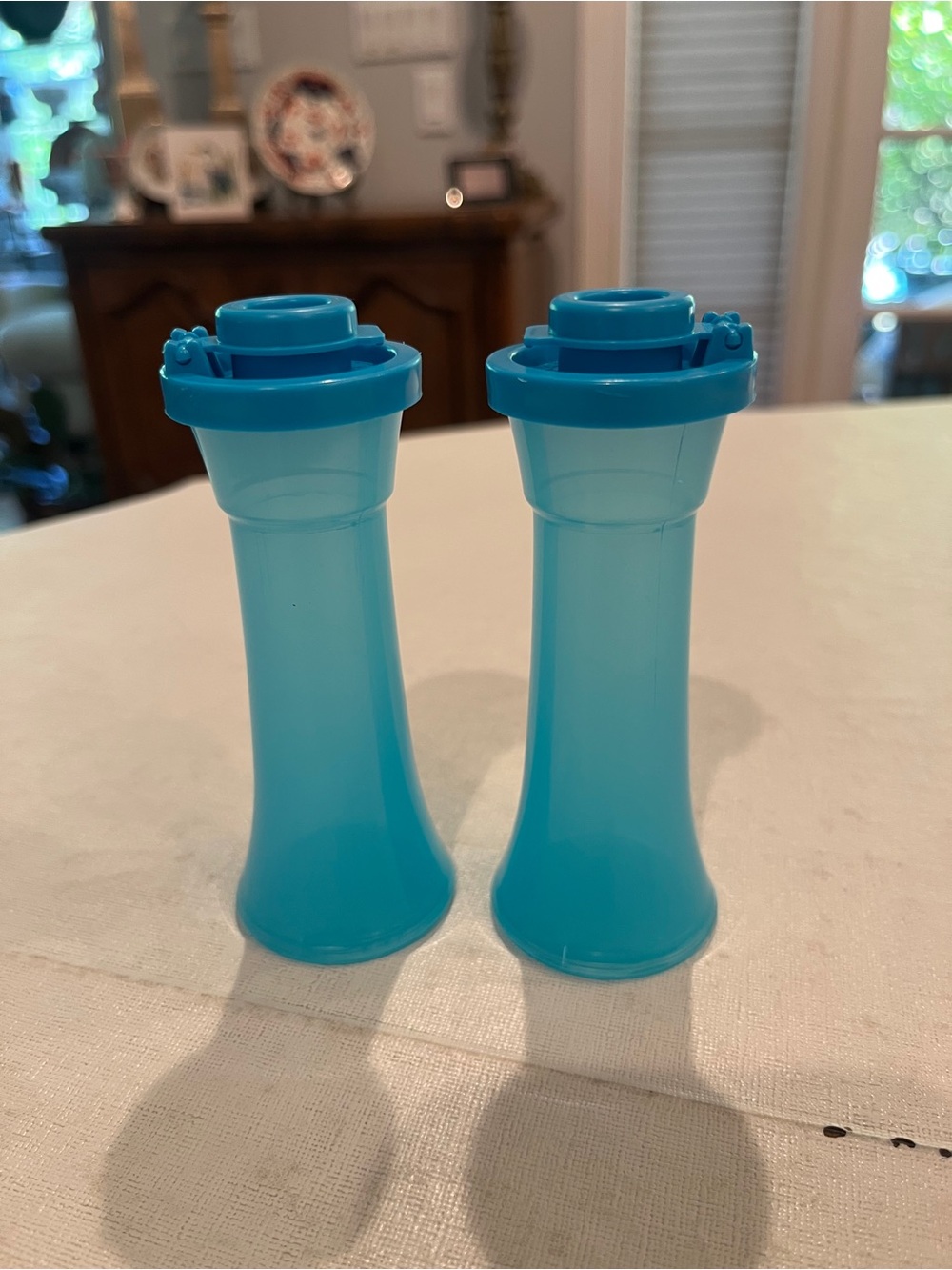 Vintage style Tupperware capri blue mini salt and pepper shakers. Set of 2